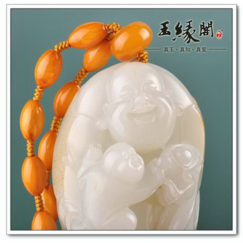 秋梨皮羊脂玉籽料 童子戏佛把件