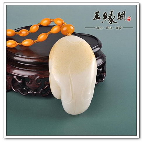 秋梨皮羊脂玉籽料 童子戏佛把件