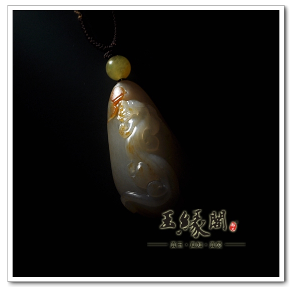 黄皮籽料挂件 必定成龙