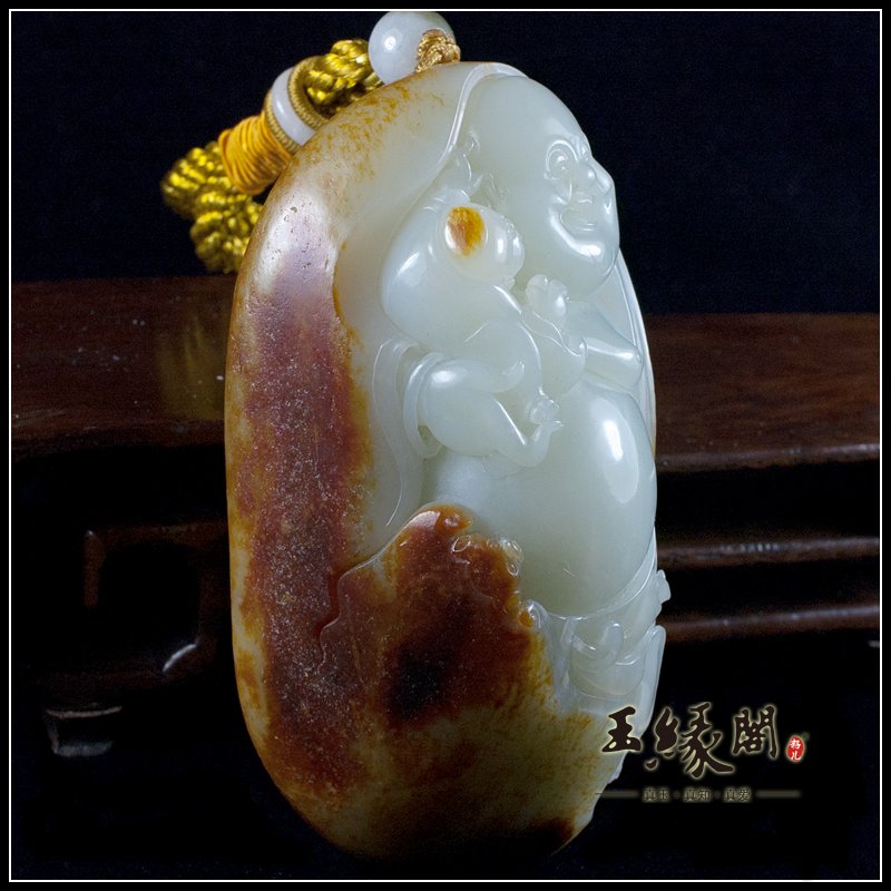 红皮籽料把件 童子戏佛