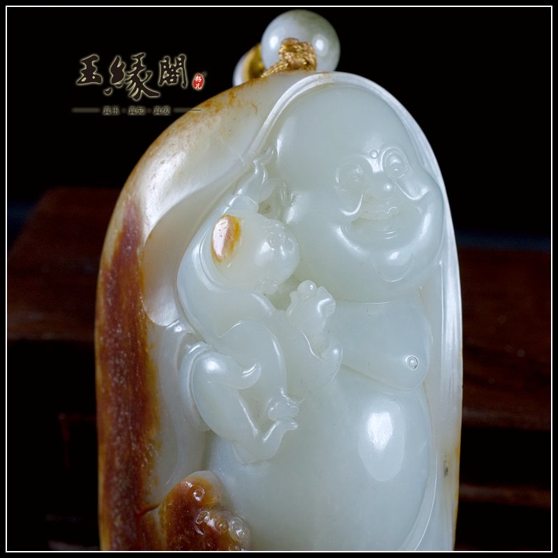 红皮籽料把件 童子戏佛
