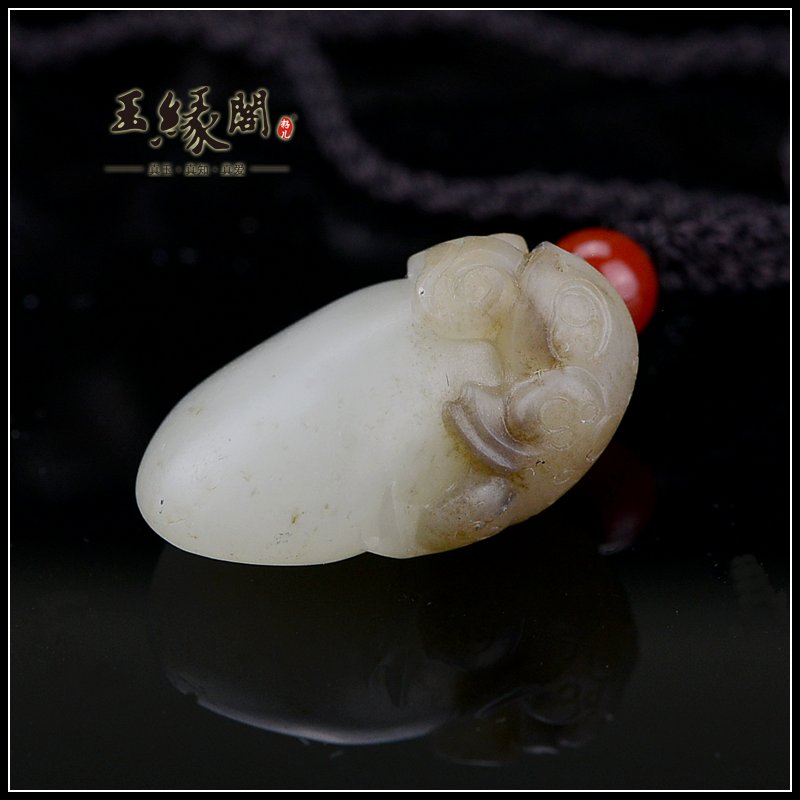 褐皮籽料挂件 金钱如意